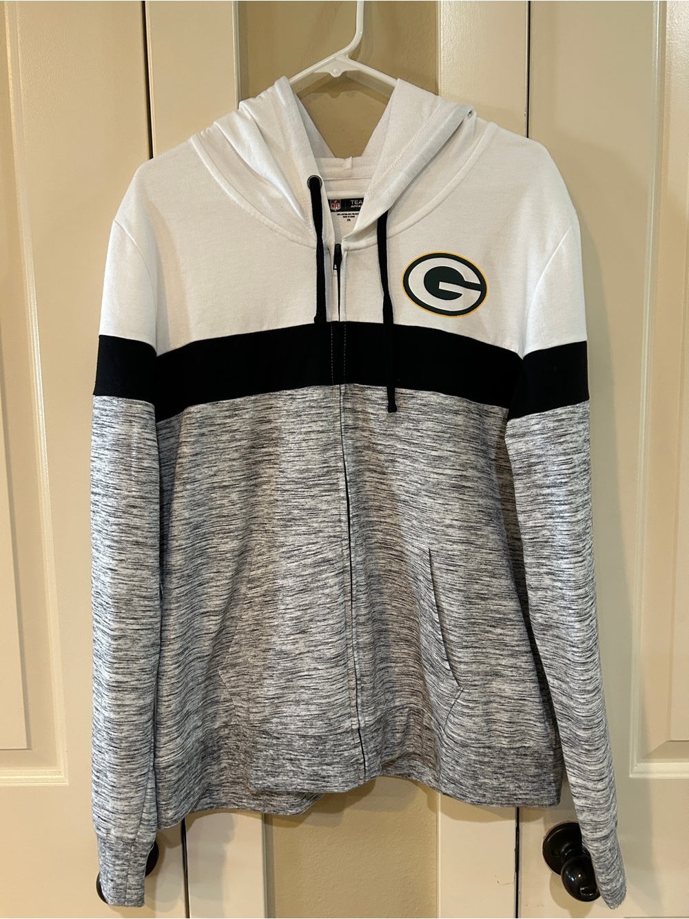 Official NFL Team Apparel Green Bay Packers full-zip hoodie.